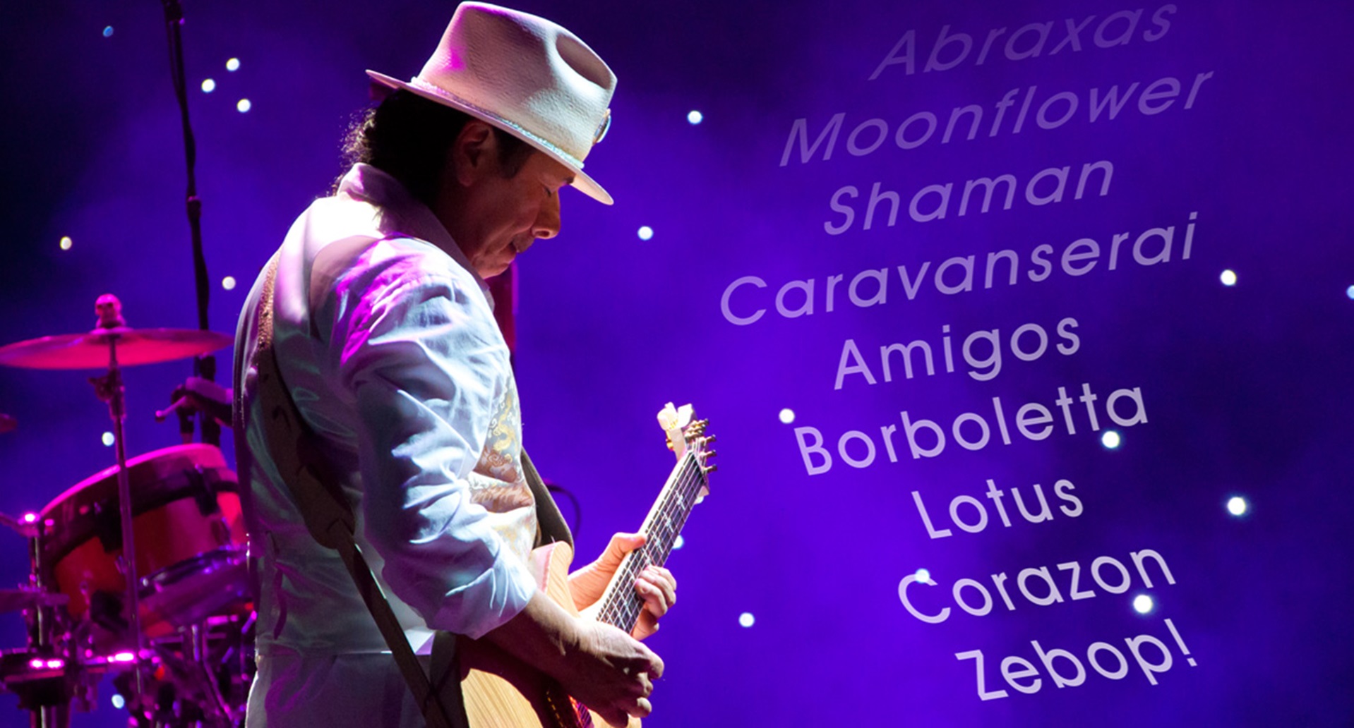 Carols Santana on guitar with song lyrics