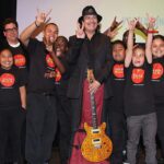 Milagro Foundation kids and Carlos Santana