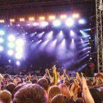 audience in front of stage for live music performance